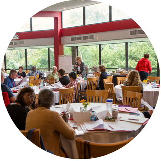 conference in dining room full of people