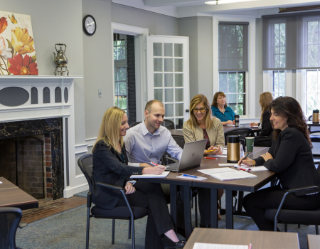 working together during meeting in conference room b